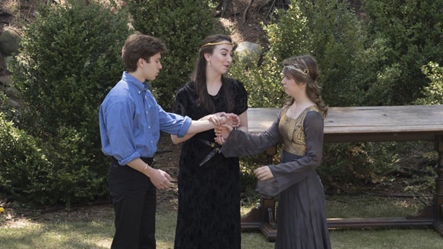 Students performing a Shakespeare play in Slayton Arboretum.