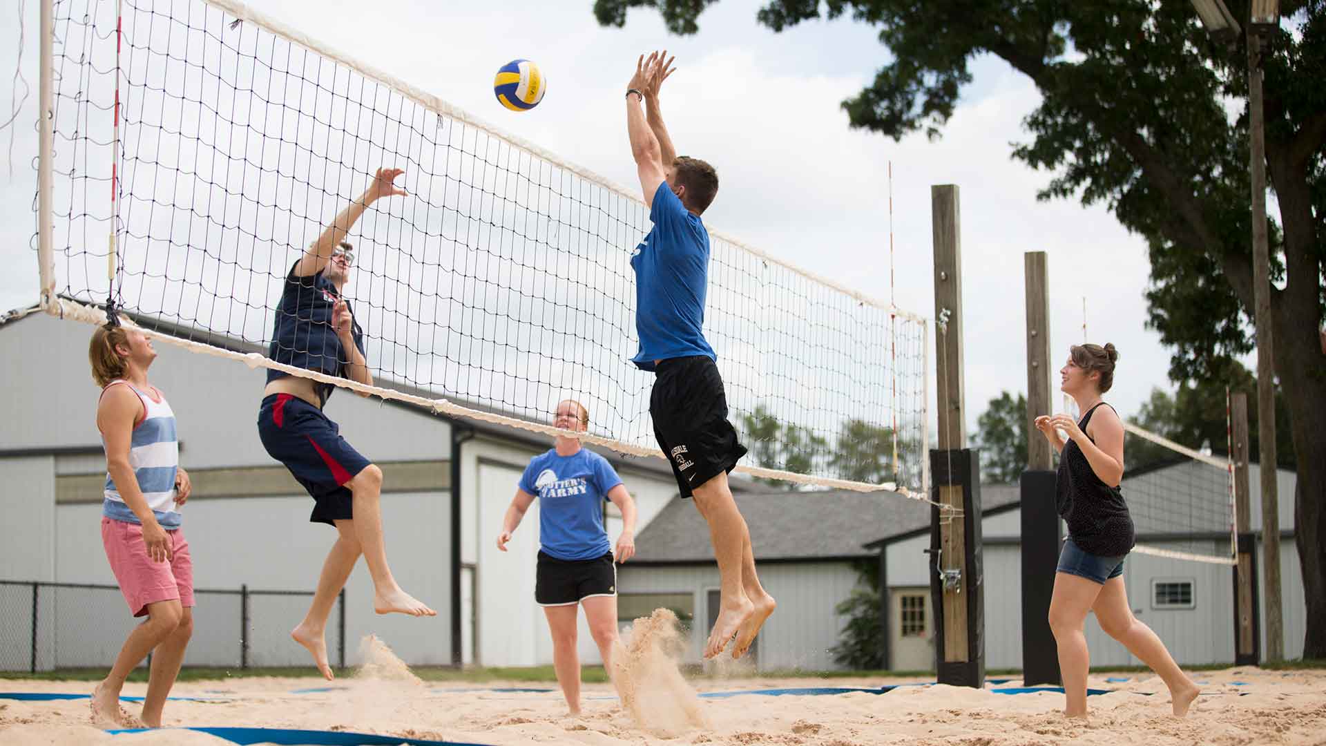 Students playing Volleyball in Hayden park.